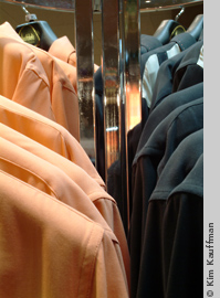 image of shirts on rack by michigan photographer kim kauffman for retail store promotional materials
