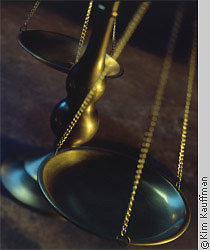 Table top photo of balance scales by corporate photographer kim kauffman for corporate photography use